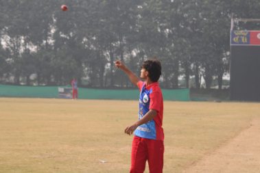 Player practicing spin bowling