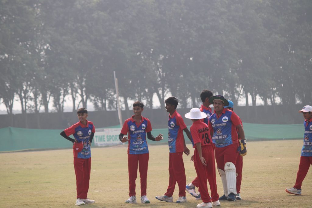 Team huddling before match