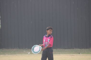 Young cricketer focusing intensely