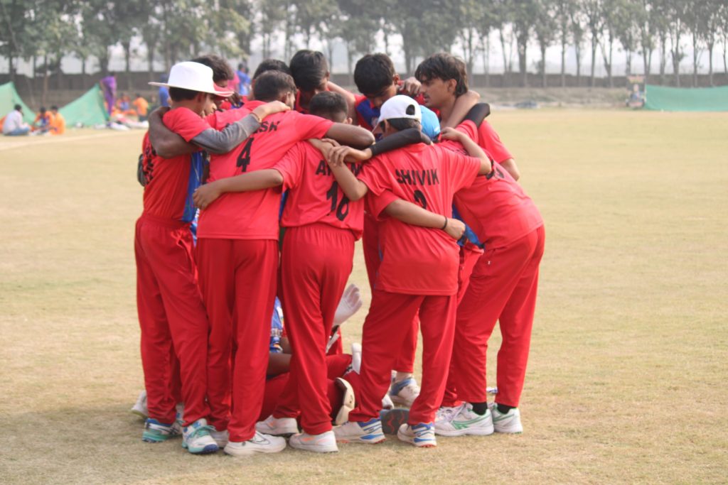 Team cheering after wicket