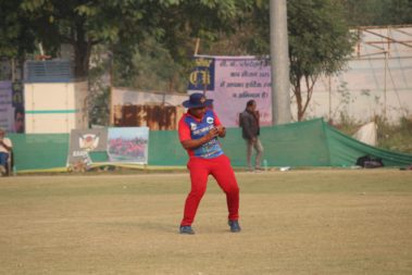 Cricketer preparing to field