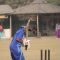 Batsman executing reverse sweep