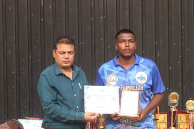 Young player showing certificate