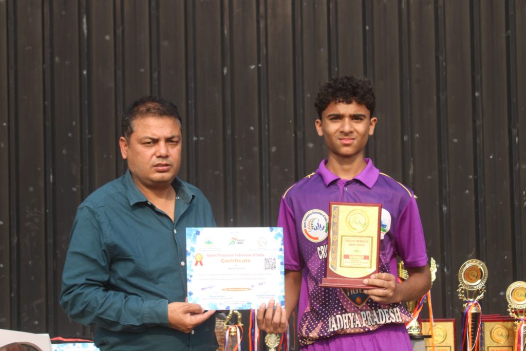 Young player showing certificate