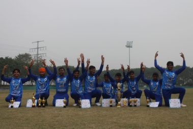 Team group photo with trophy