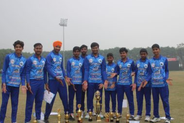 Team group photo with trophy